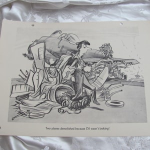 May include: A black and white illustration depicting two crashed planes with a man observing the wreckage. The caption states, "Two planes demolished because Dil wasn't looking!" The image is on cream paper with three punched holes.