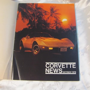 May include: A magazine cover featuring a cream-colored Corvette sports car with a sunset backdrop and palm trees. The text "CORVETTE NEWS OCT/NOV 1976" is displayed in white on a black background.