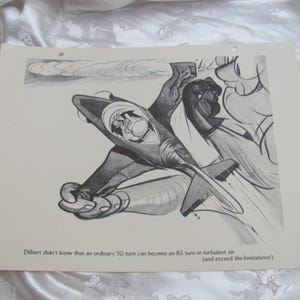 May include: Monochrome illustration of a jet plane in flight, with a pilot visible in the cockpit. The image includes text that reads, "Dilbert didn't know that an ordinary 5G turn can become an 8G turn in turbulent air (and exceed the limitations!)"