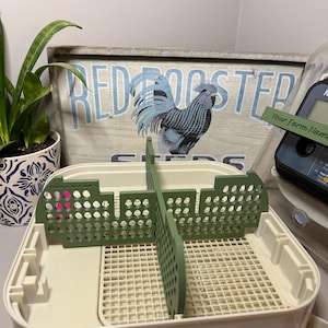May include: A cream-colored plastic tray with a grid-patterned base and two removable olive green dividers featuring a perforated design. The tray includes a small printed logo reading TrinityOaksPrintCo and text labeled IMPORTANT NOTES.