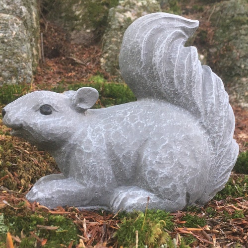 cement squirrel statue