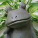 relaxing frog statue