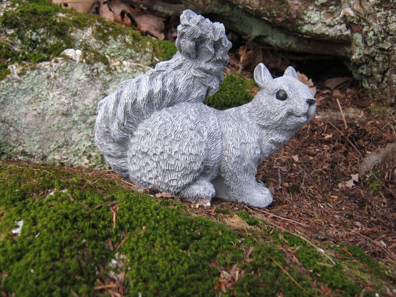 cement squirrel statue