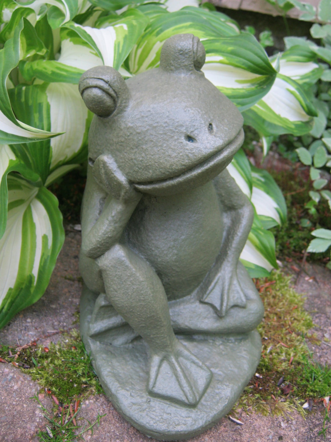 relaxing frog statue