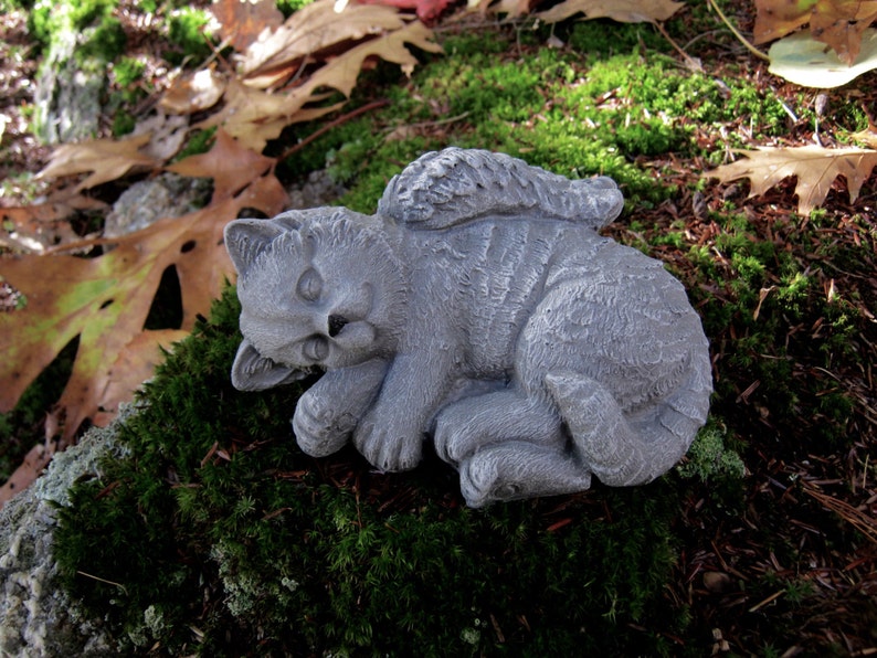 dog and cat statues