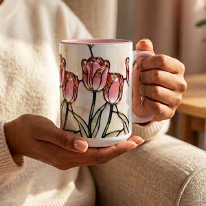 Aesthetic coffee mug with stained glass tulip artwork on white base.