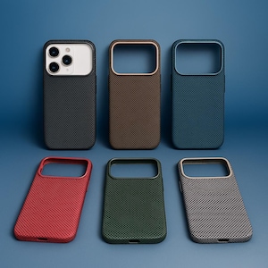 May include: Six phone cases in various colors: black, brown, blue, red, green, and gray. Each case has a textured surface and a camera cutout. The cases are displayed against a blue background.