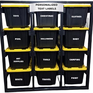 May include: A black storage unit with yellow-rimmed bins labeled for various items, including toys, clothes, and tools. The text "PERSONALIZED TEXT LABELS" is at the top. The bins are organized for storage and organization.