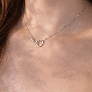 May include: A rustic wooden sign with the text "Welcome to our home" in white lettering. The sign features a distressed finish and a simple, inviting design, perfect for a front porch or entryway.