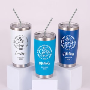 May include: Three stainless steel tumblers with straws, each featuring a different color: white, turquoise, and blue. The tumblers are personalized with the text "Girl's Trip 2025" and individual names, with "Jamaica 2026" below.
