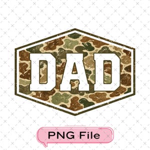 May include: A graphic featuring the word "DAD" in white, set within a brown and green camouflage hexagon. The design has a distressed appearance. The text is in a bold font. A pink speech bubble at the bottom says "PNG File".