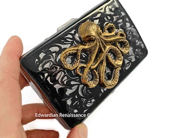 Octopus-sigarettenkoker: antiek gouden kraken, zwart wervelend emaille