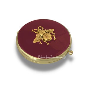 Queen Bee Compact Mirror Inlaid in Hand Painted Ox Blood Enamel Art Nouveau Insect Design with Personalized and Color Options