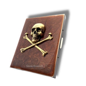 Antigua calavera de oro y huesos cruzados Estuche de cigarrillos en cobre pintado a mano Esmalte gótico Punk Diseño con opciones personalizadas y de color