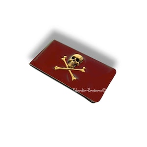 Calavera de oro antigua y huesos cruzados Clip de dinero con incrustaciones en esmalte de sangre de buey brillante gótico victoriano inspirado con opciones personalizadas y de color
