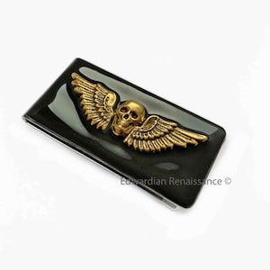 Cráneo con alas Clip de dinero con incrustaciones en esmalte negro pintado a mano Steampunk Gótico inspirado colores personalizados y opciones personalizadas