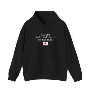 May include: Black hooded sweatshirt with the text "All the information is on the task" in white, above a small graphic of an envelope with a red wax seal. The sweatshirt has a front pocket and a drawstring hood.