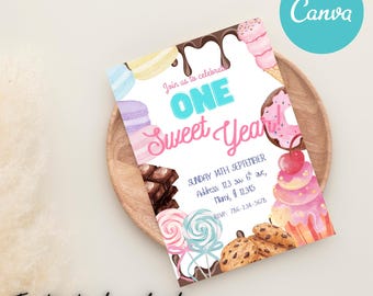 May include: A vibrant invitation card featuring the text "ONE Sweet Year!" and illustrations of sweets. The design includes event details and the Canva logo, perfect for a first birthday celebration.