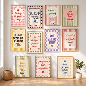 May include: A collection of eleven rectangular wall art prints in wooden frames, each featuring colorful patterns and motivational text such as today is your day, be kind work hard, believe in yourself, you can do hard things, and others.