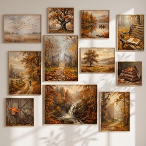 Könnte beinhalten: Ein Galerie-Wandset aus elf gerahmten Kunstdrucken mit herbstlichen Landschaften, darunter ein großer Baum, ein Waldweg mit Tor, ein Wasserfall, ein Fahrrad mit Kürbiskorb, eine Parkbank mit Buch sowie Stapel alter Bücher.