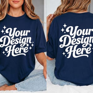May include: Navy blue t-shirt with the text "Your Design Here" in white script. The design is on the front and back of the shirt. The shirt is a comfortable, casual style.