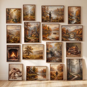 Könnte beinhalten: Eine Galerie-Wand mit vierzehn gerahmten Kunstdrucken, die herbstliche Landschaften, gemütliche Hütten, einen Steinkamin, eine Holzbrücke, einen Bücherstapel mit Federkiel sowie einen Schal mit Teetasse in warmen Orange- und Brauntönen zeigen.