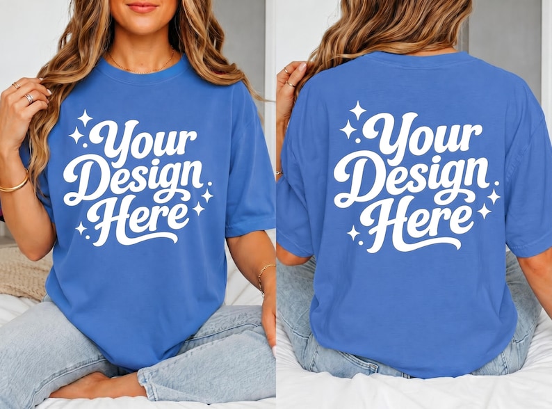 May include: A blue t-shirt with the text "Your Design Here" in white script. The design is on the front and back of the shirt. The shirt is a solid blue color.