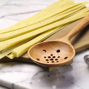 Handmade treenware wooden colander spoon hand carved from Cherry wood