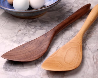 Handmade wooden saute spurtle kitchen utensil of Walnut wood for stirring and mixing