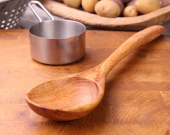 Medium sized handmade treenware wooden spoon for stirring and serving carved from salvaged Mesquite wood