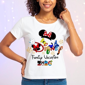 May include: White t-shirt featuring a colorful Disney design with Mickey Mouse ears, the word "DISNEY", and the text "Family Vacation 2006". The design includes various character elements and accents.
