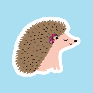 May include: A cartoon illustration of a smiling hedgehog with brown quills, a pink face, and a pink hearing aid. The hedgehog is outlined in white against a light blue background.