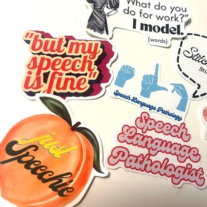 May include: A collection of stickers with various designs and text. One sticker features a peach with the words "just Speechie." Other stickers include phrases like "but my speech is fine" and "Speech Language Pathologist."