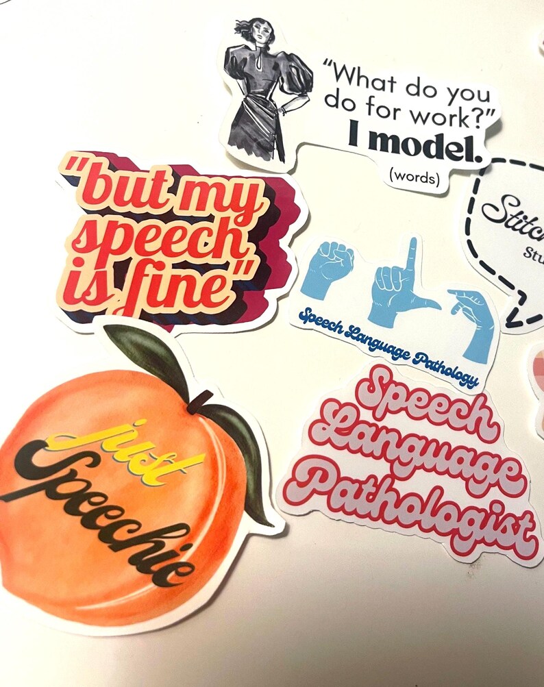 May include: A collection of stickers with various designs and text. One sticker features a peach with the words "just Speechie." Other stickers include phrases like "but my speech is fine" and "Speech Language Pathologist."