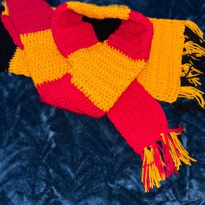 Football team themed crochet scarfs