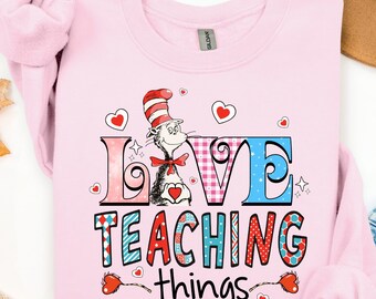Sudadera con capucha "Maestro de San Valentín" inspirada en el Dr. Seuss, "Amo la enseñanza"