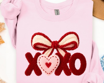 Sudadera con lazo XOXO, un regalo coqueto para San Valentín