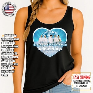 May include: Black tank top featuring a heart-shaped graphic with the Backstreet Boys and the text "Into the Millennium." The design includes a group photo of the band. The tank top also has a "Made in the USA" logo.