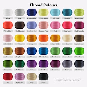 May include: A color chart titled Thread Colours displaying forty-two circular spools of embroidery thread in various shades including white, silver, blues, greens, pinks, yellows, oranges, browns, purples, grays, and black with text labels.
