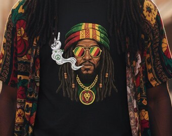 May include: Black t-shirt featuring a detailed illustration of a man with dreadlocks, wearing a Rastafarian-style hat and sunglasses. The graphic includes a peace sign and a lion pendant. The shirt is paired with a colorful patterned button-down shirt.