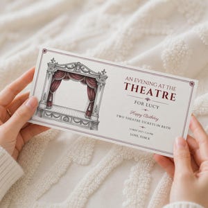 May include: A rectangular gift ticket featuring a detailed black and white illustration of a theatre stage with deep red curtains. The text reads: AN EVENING AT THE THEATRE FOR LUCY, Happy Birthday, TWO THEATRE TICKETS IN BATH, 14 MAY 2027 7:30 PM, LOVE, TOM X.