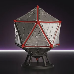 May include: A twenty-sided die container featuring metallic silver triangular panels with engraved symbols, separated by vibrant red structural edges. The object is supported by a black circular stand with four legs, displaying a geometric design.
