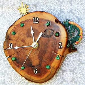 Kokopelli with Sunburst Log Cabin Style 7&quot; x 7&quot; x 1.25&quot; Rustic Wall Clock