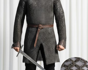 May include: A long-sleeved chainmail shirt with a brown leather belt and a long sword. The shirt is made of small, interlocking metal rings. The sword has a long, straight blade and a simple crossguard. The outfit is worn with black pants.