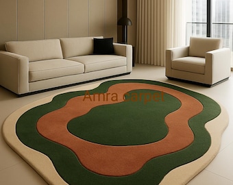 Alfombra abstracta moderna en tonos verde y terracota. Alfombra acogedora hecha a mano para sala de estar.