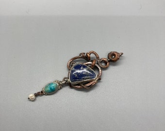 Pendent with mix metals,forge copper and sterling silver