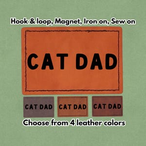 Puede incluir: Un parche de cuero naranja con el texto "CAT DAD" en letras negras en negrita. Debajo hay tres parches más pequeños con el mismo texto. La imagen también incluye el texto "Hook & loop, Magnet, Iron on, Sew on" y "Choose from 4 leather colors."