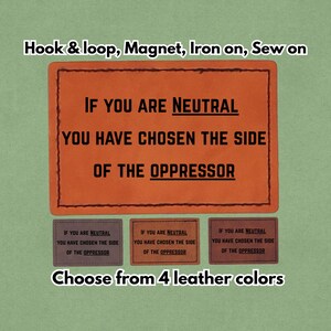 Op de afbeelding: Oranje leren patch met de tekst "IF YOU ARE NEUTRAL YOU HAVE CHOSEN THE SIDE OF THE OPPRESSOR." Opties: klittenband, magneet, opstrijkbaar of op te naaien. Verkrijgbaar in 4 leerkleuren.