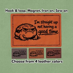 May include: Orange leather patch with a grumpy frog illustration and the text "I'm straight up not having a good time." The image also shows three smaller patches in different colors, and text that says "Choose from 4 leather colors."