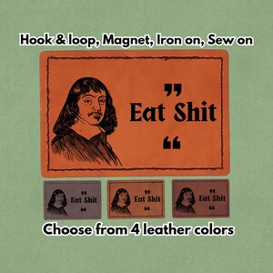 Könnte beinhalten: Orangenes Lederpatch mit einem Porträt und dem Text "Eat Shit" in Schwarz. Darunter drei kleinere Patches in verschiedenen Farben, jeweils mit dem gleichen Design. Der Text "Wählen Sie aus 4 Lederfarben" steht unten.